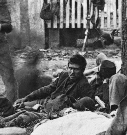 wounded men at a field hospital, close up