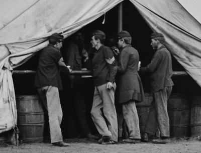 soldiers standing at a sutler's tent